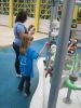 Children's Museum Houston - Ann Thompson working the valve at the water flow display. Children's Museum Houston - Ann Thompson working the valve at the water flow display.